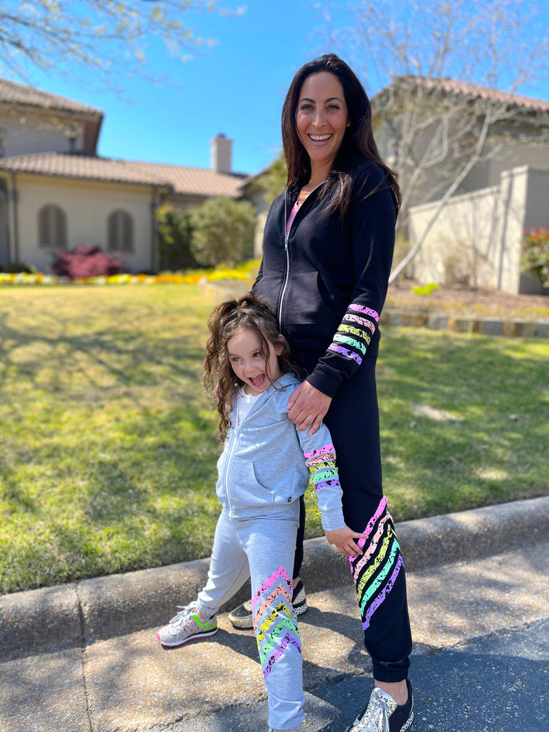 Mom and daughter wearing cool pixielane outfits in their front yard.