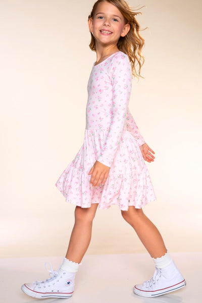 A girl walking in the Tiered Dress, Pink Ditsy Floral